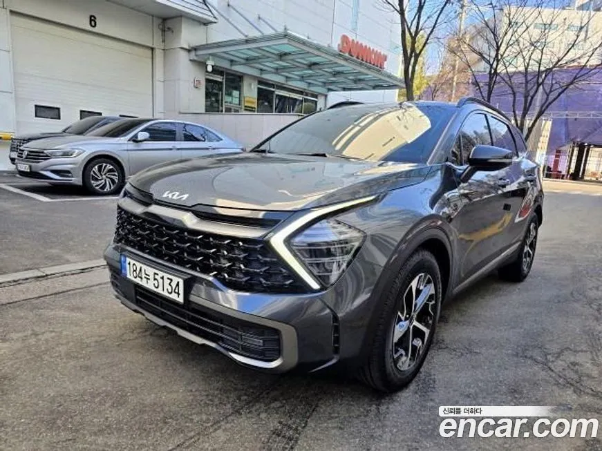 Kia Sportage — фото 1