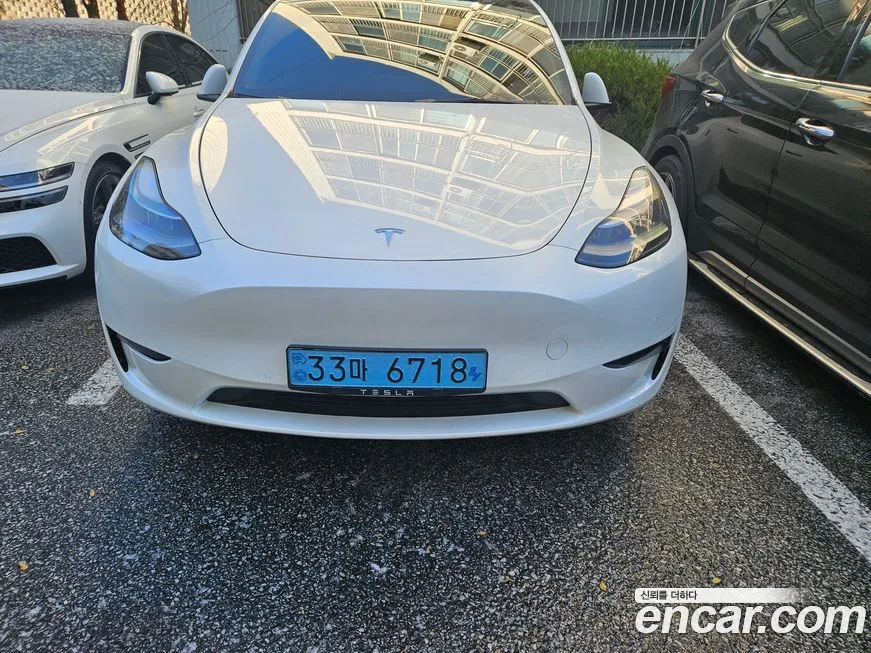Tesla Model Y — фото 10