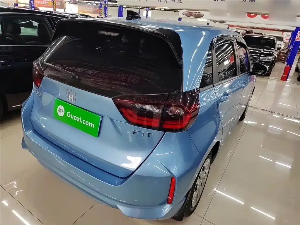 Honda Fit — фото 8