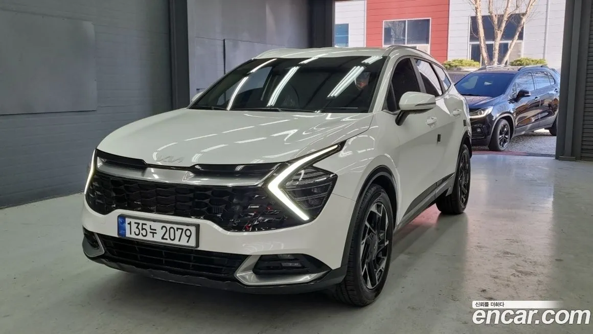 Kia Sportage — фото 1