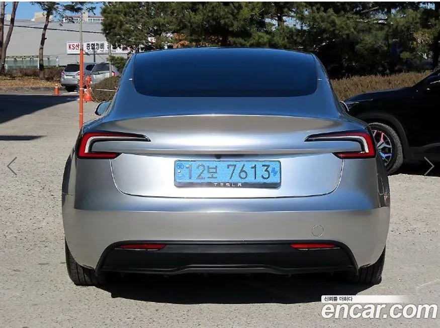 Tesla Model 3 — фото 10