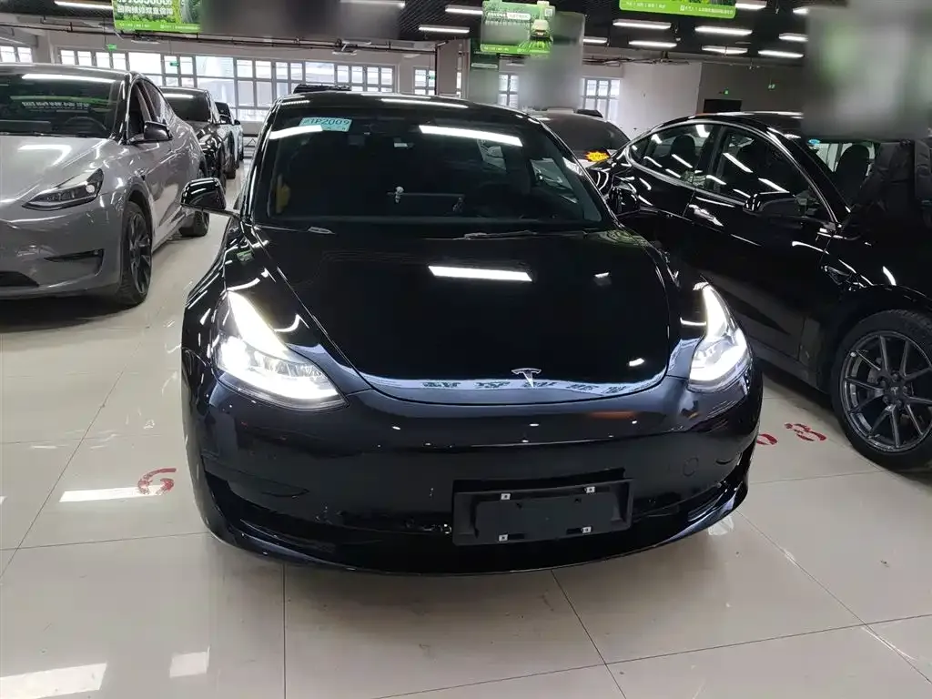 Tesla Model 3 — фото 6