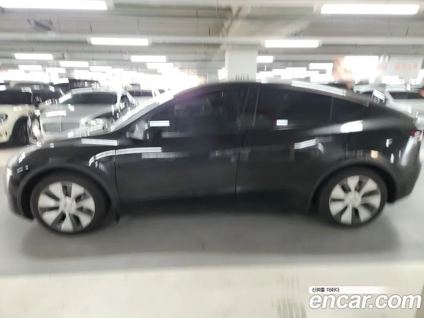 Tesla Model Y 2024 из KR, фото 2