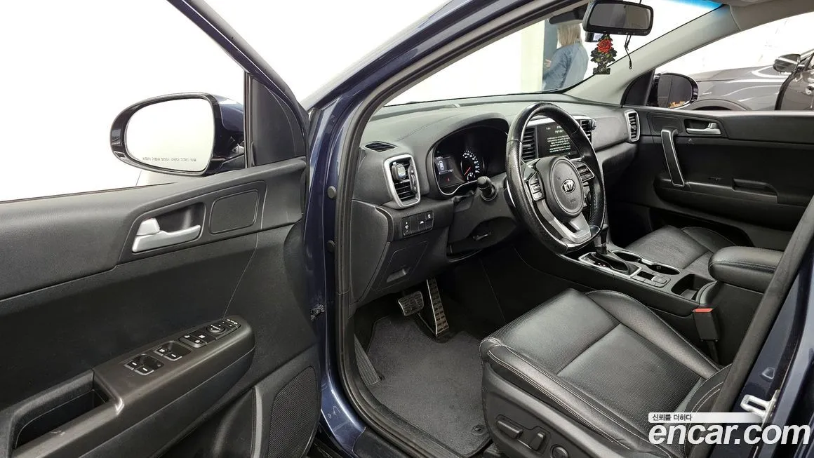 Kia Sportage — фото 8