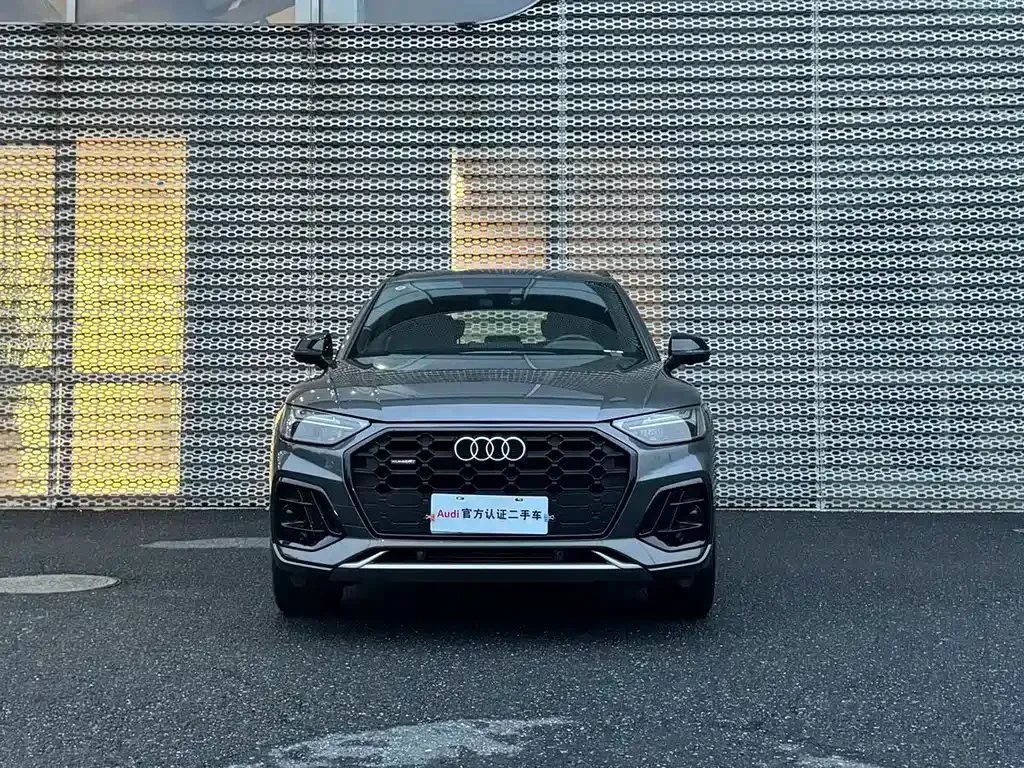 Audi Q5L — фото 10