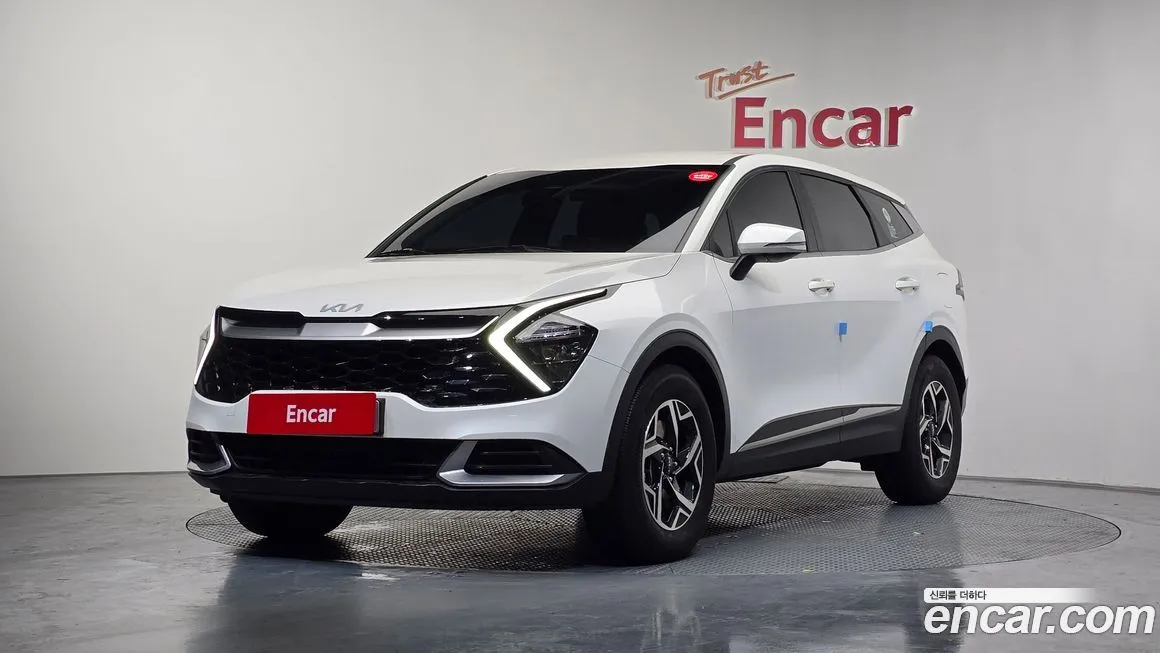 Kia Sportage — фото 1