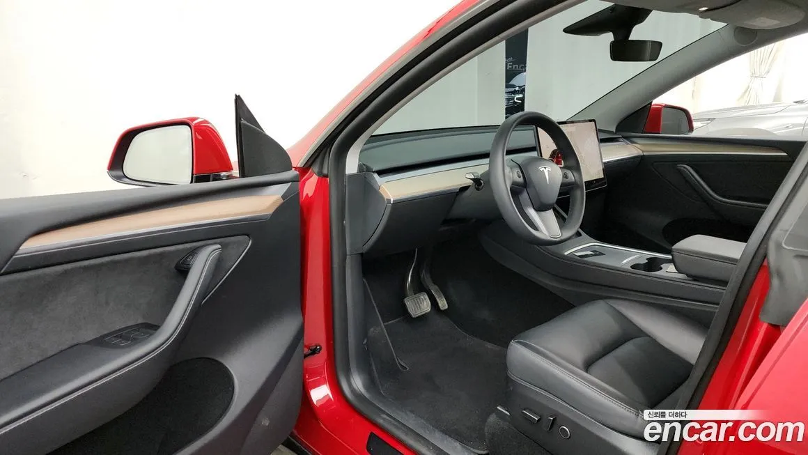 Tesla Model Y — фото 6