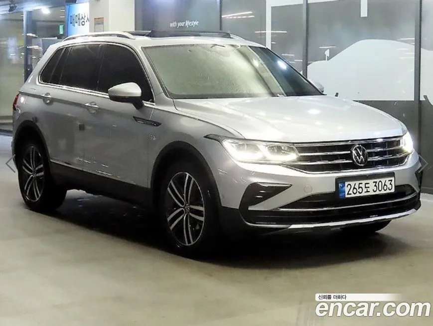 Volkswagen Tiguan — фото 1