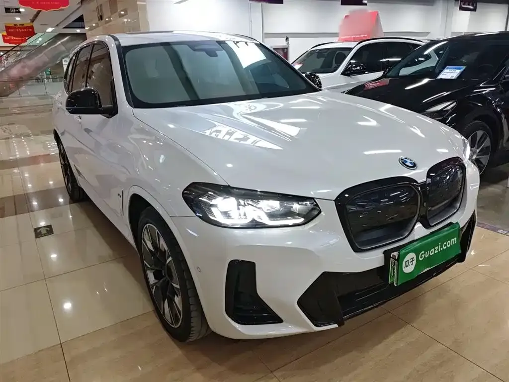BMW iX3 — фото 9