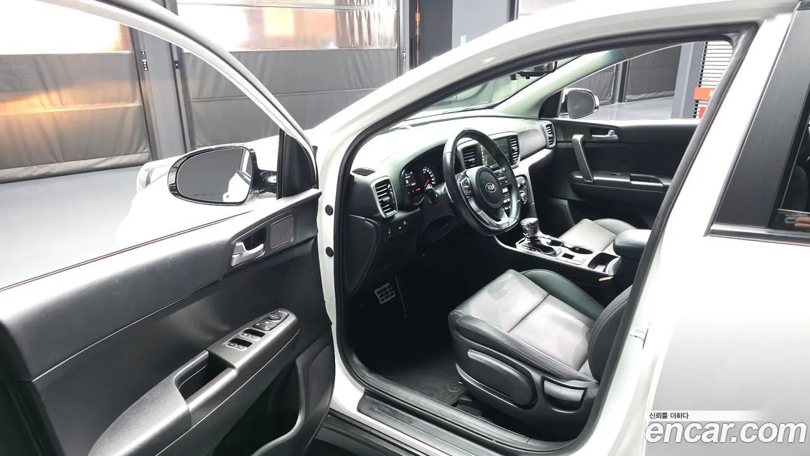 Kia Sportage — фото 10