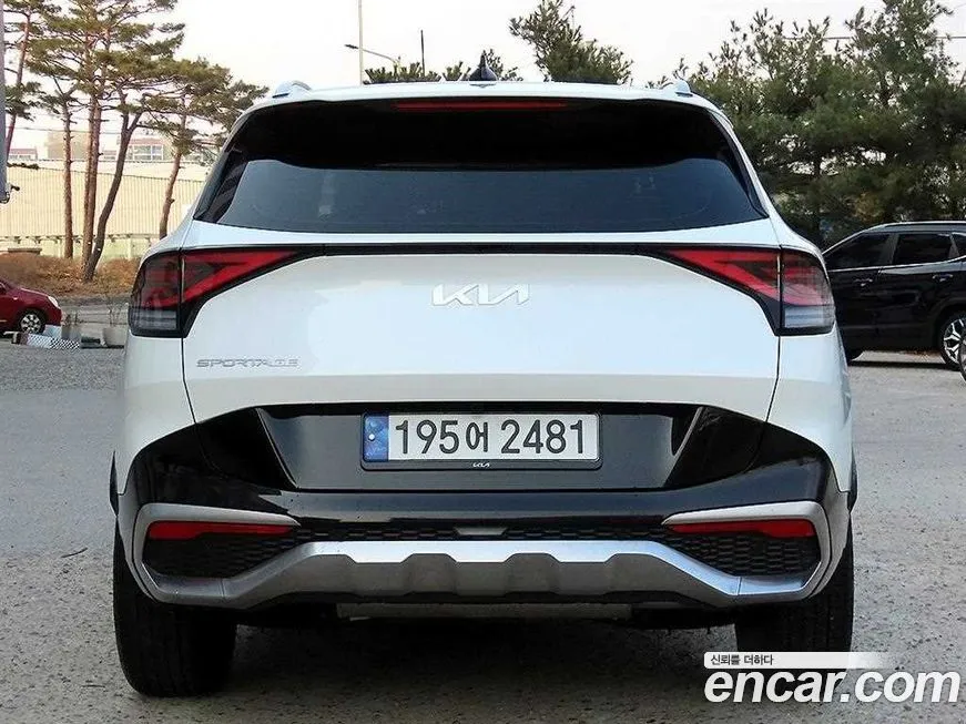 Kia Sportage — фото 10