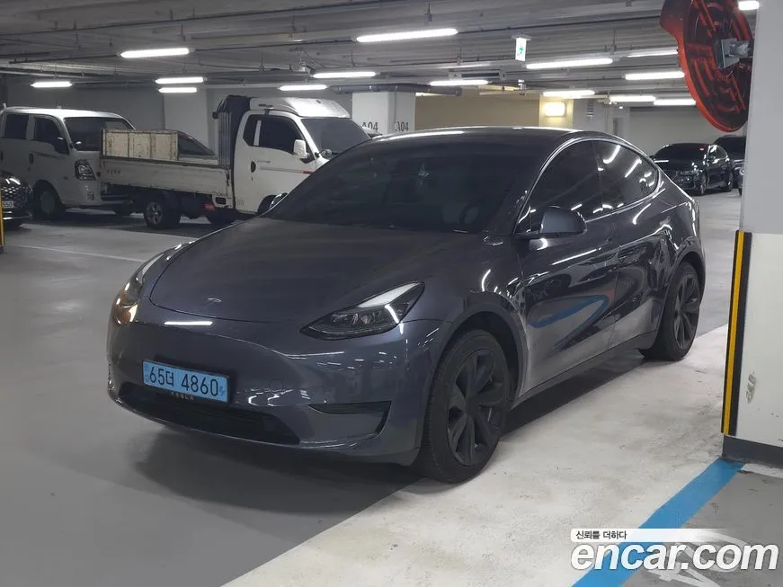Tesla Model Y — фото 9