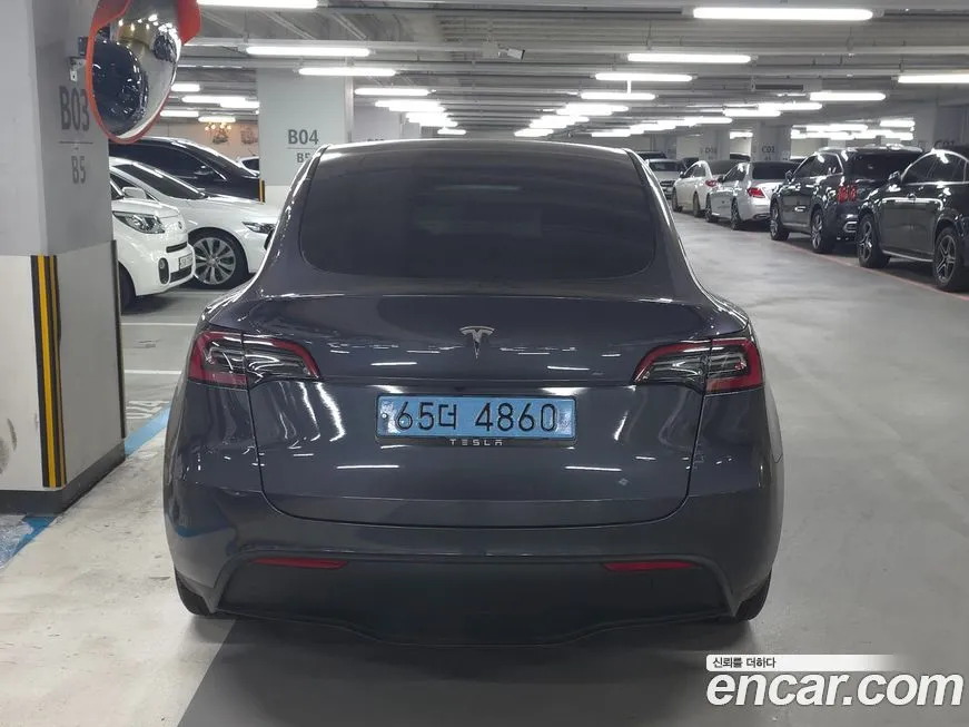 Tesla Model Y — фото 7