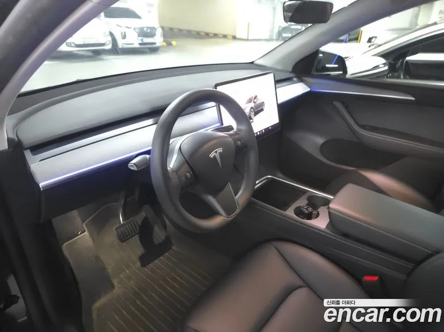 Tesla Model Y — фото 10
