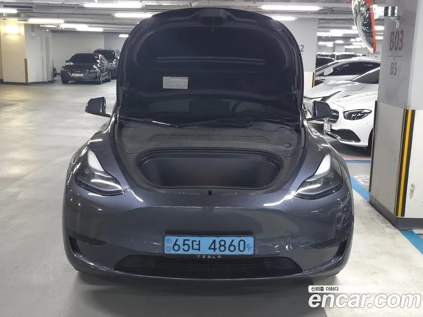 Tesla Model Y — фото 8