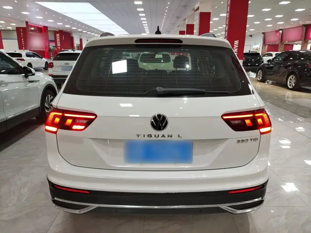 Volkswagen Tiguan L — фото 7