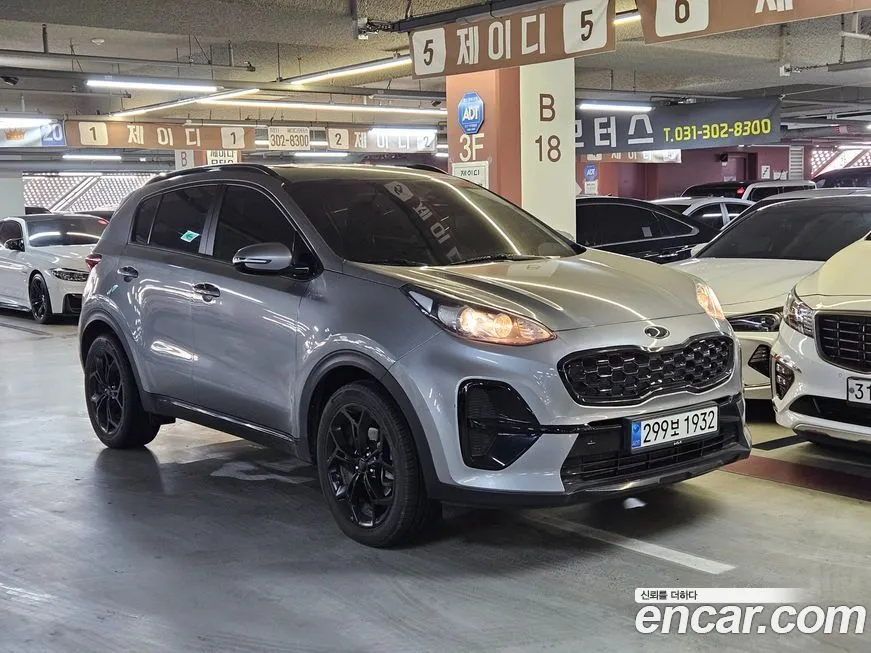 Kia Sportage — фото 1