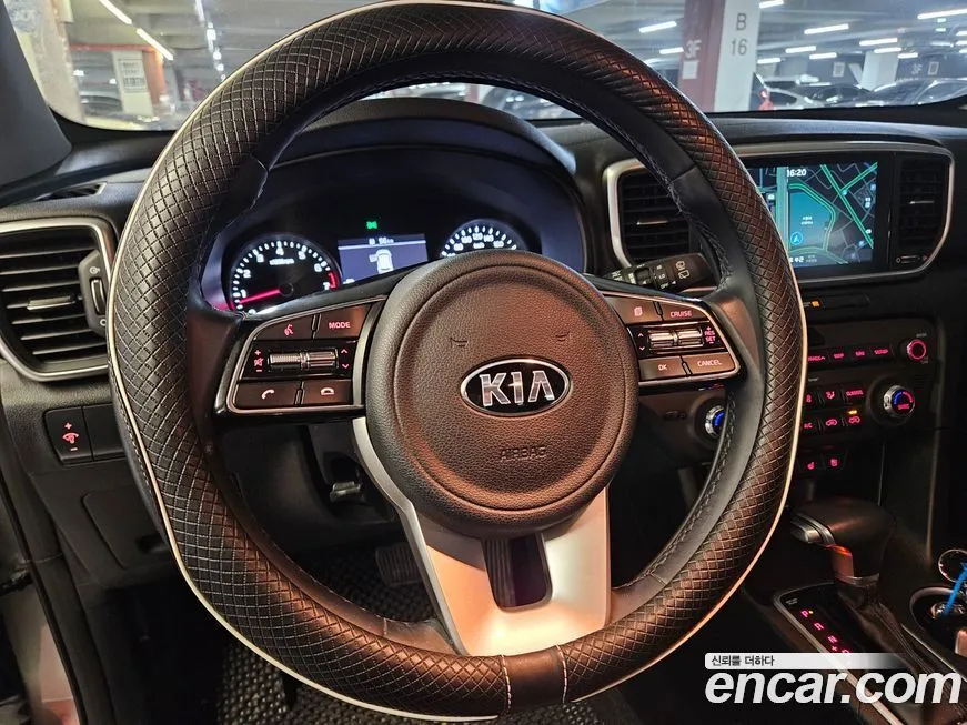 Kia Sportage — фото 7