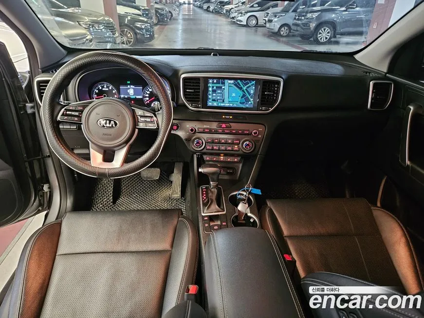 Kia Sportage — фото 9