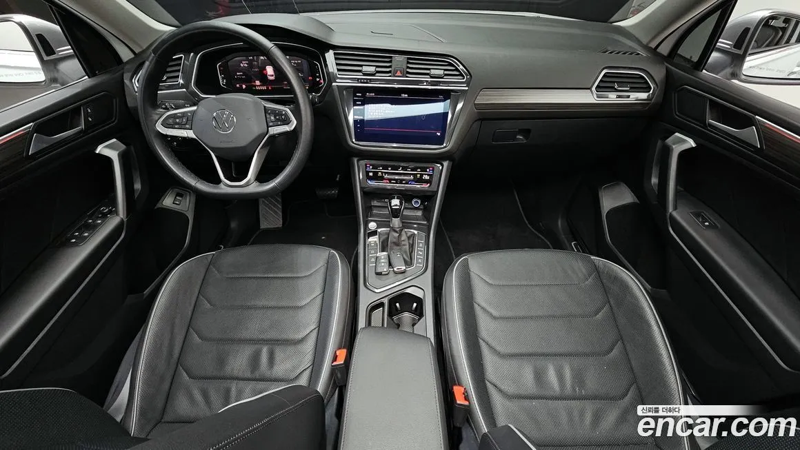 Volkswagen Tiguan — фото 9