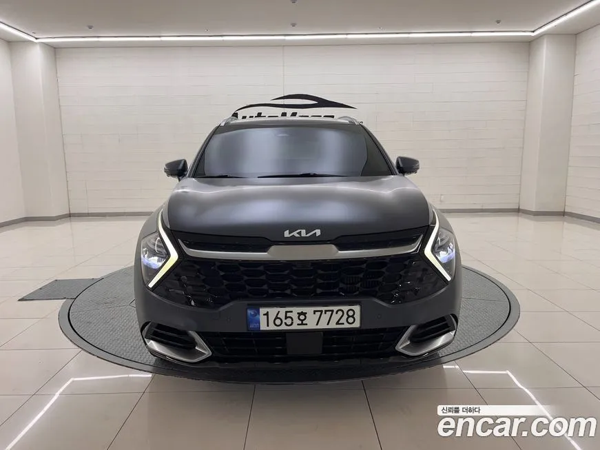 Kia Sportage — фото 1