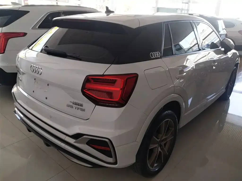 Audi Q2L 2023 из CN, фото 10