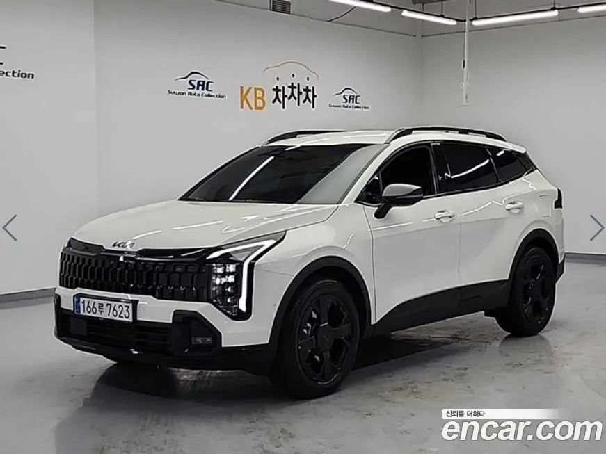 Kia Sportage — фото 1