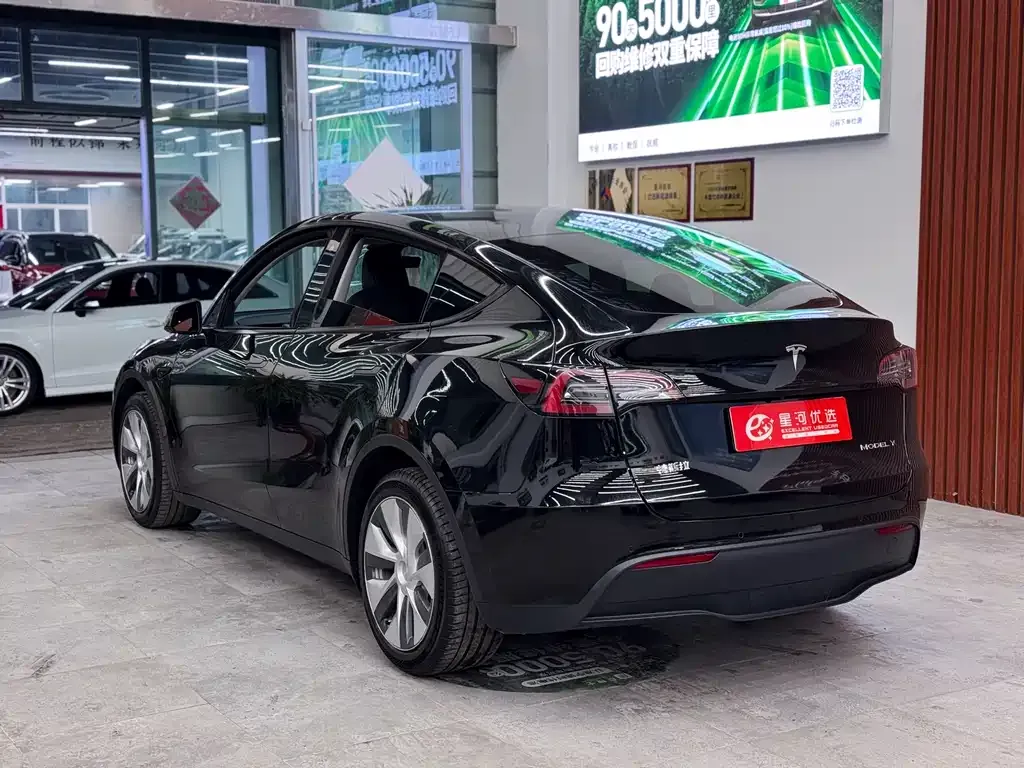 Tesla Model Y — фото 7