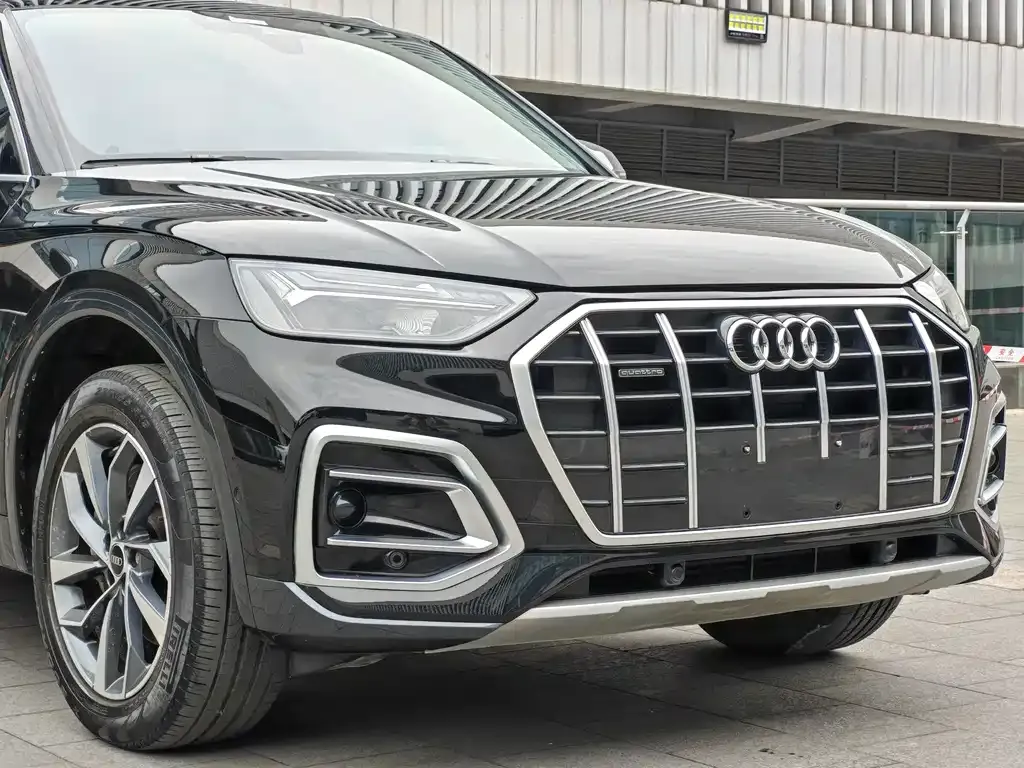 Audi Q5L — фото 10