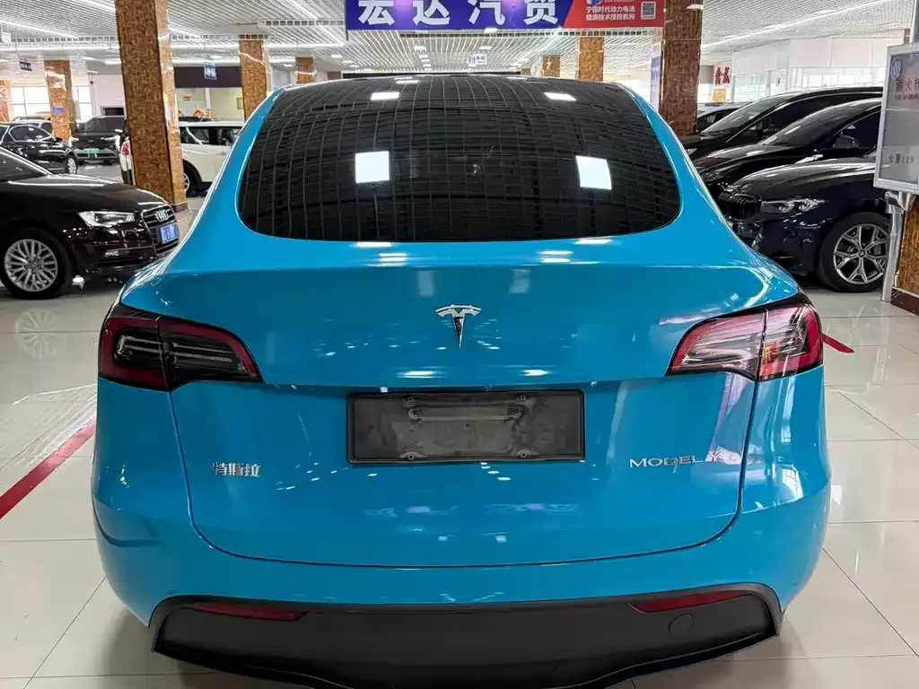 Tesla Model Y — фото 7