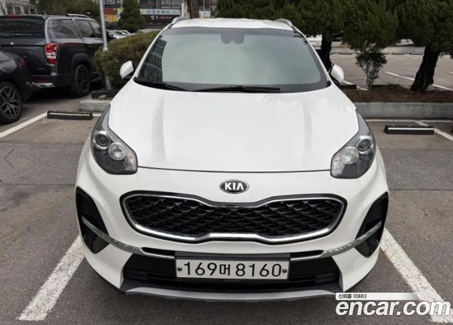 Kia Sportage — фото 1