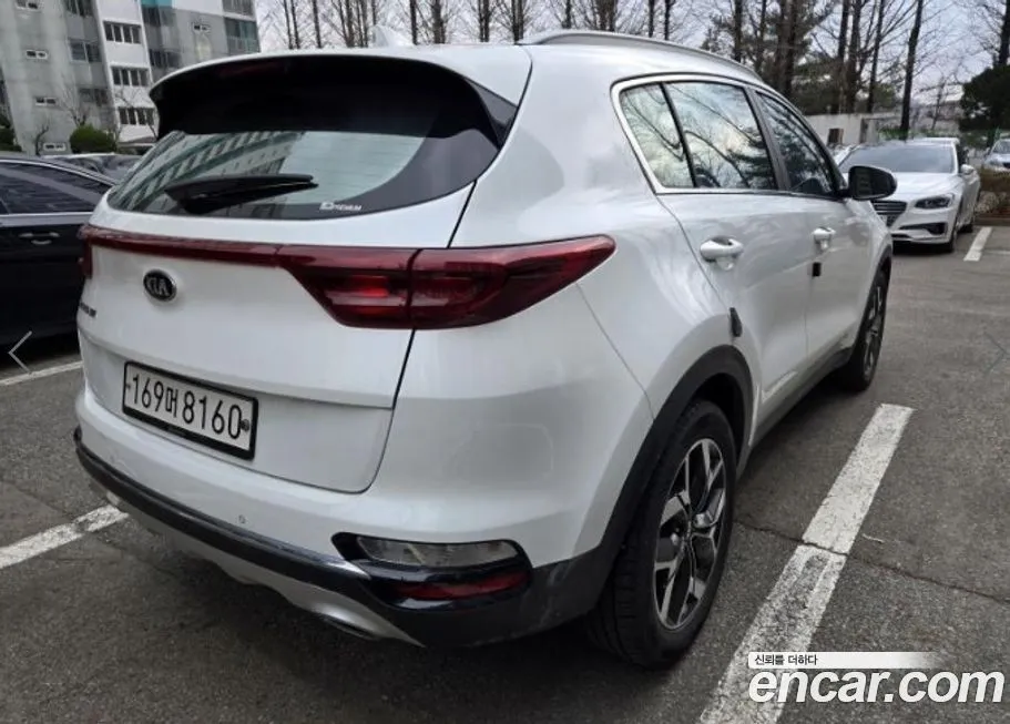 Kia Sportage — фото 6