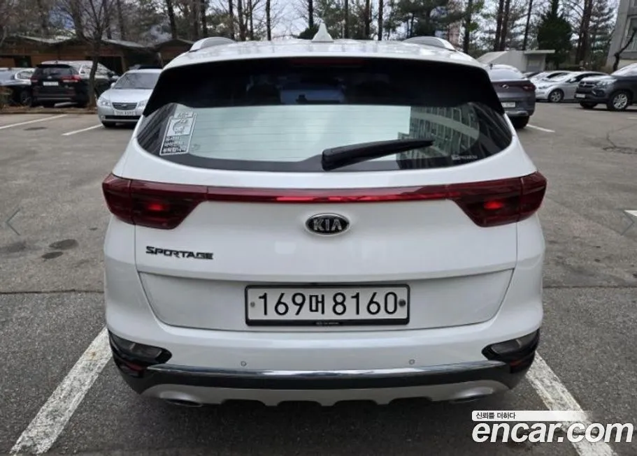 Kia Sportage — фото 10