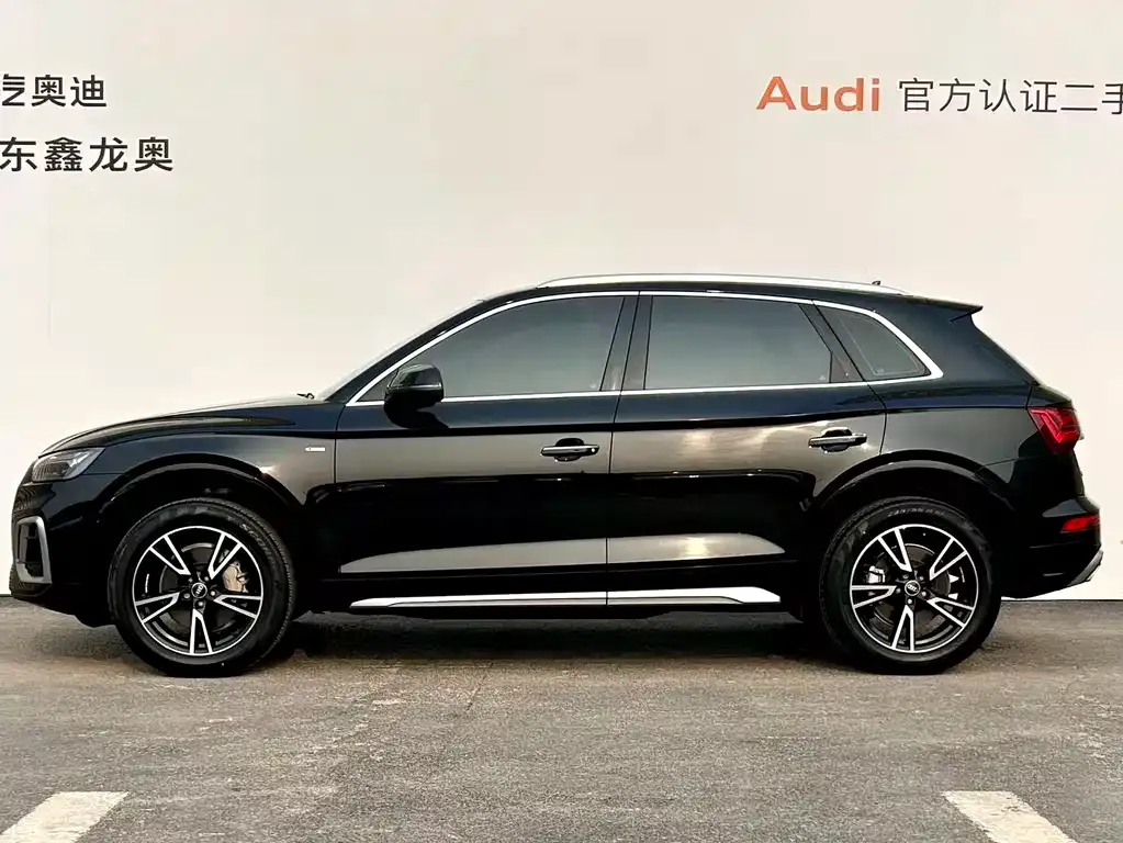 Audi Q5L — фото 5