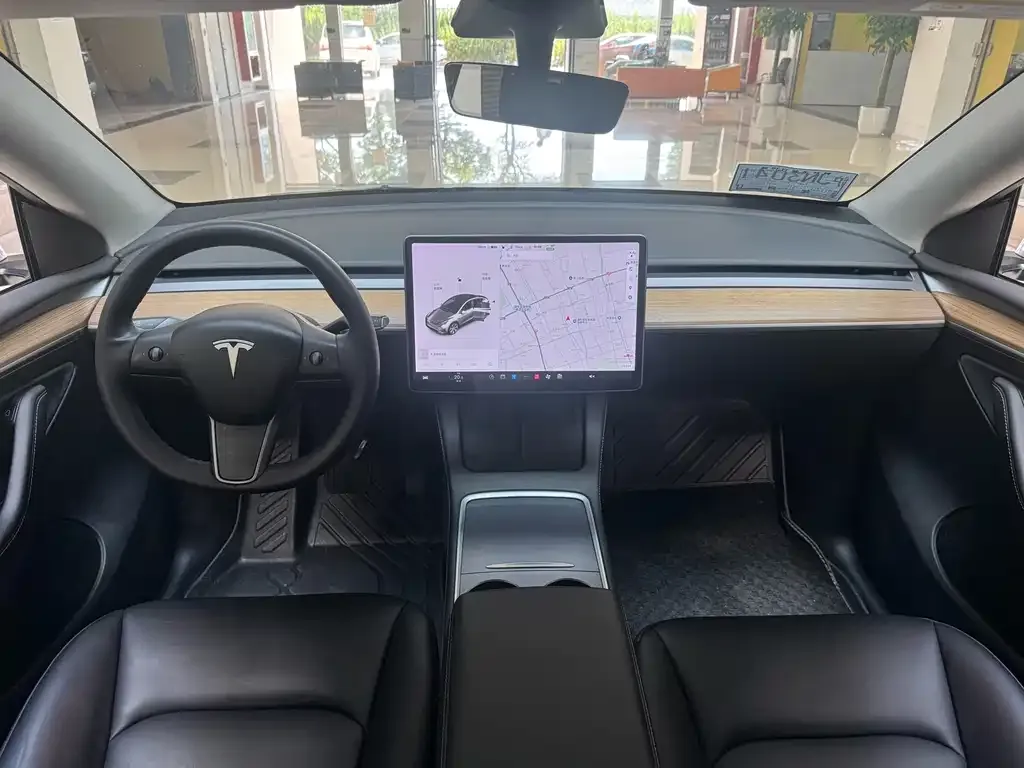 Tesla Model Y — фото 7