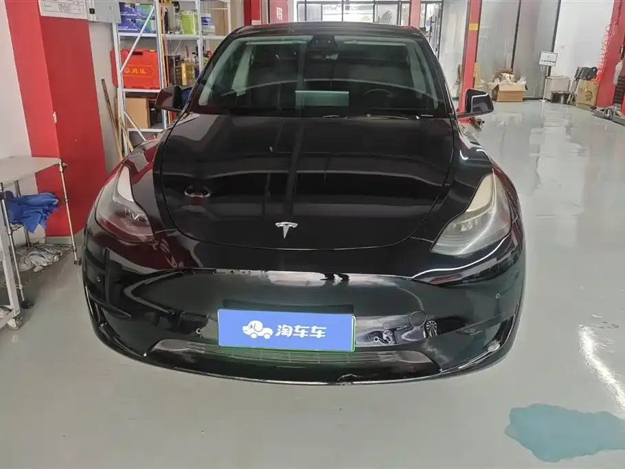Tesla Model Y — фото 10