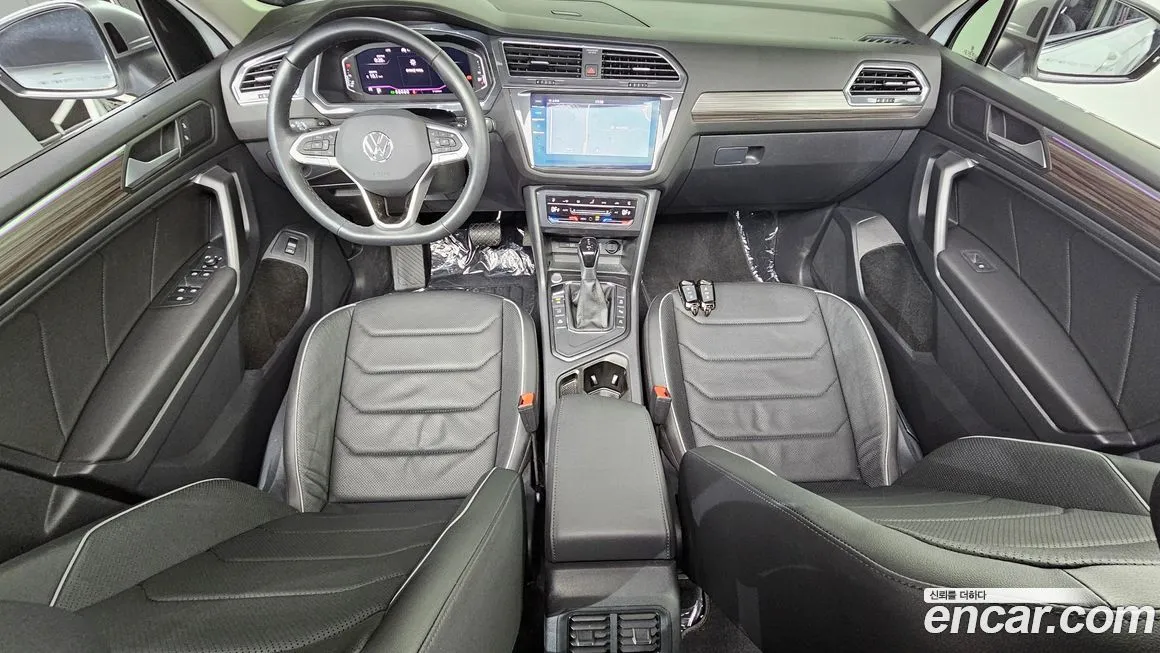 Volkswagen Tiguan — фото 10