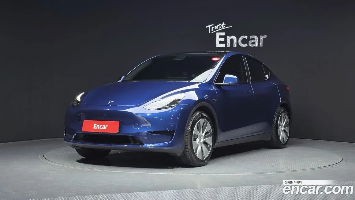 Tesla Model Y — фото 1