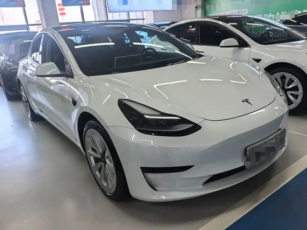 Tesla Model 3 — фото 10