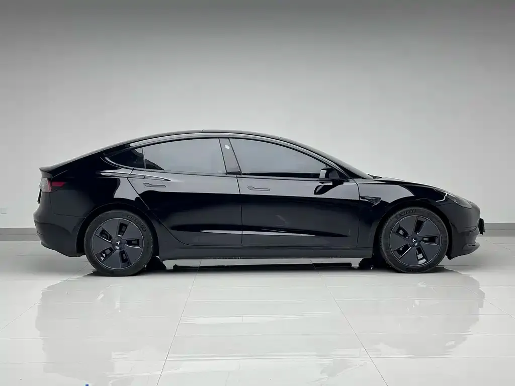 Tesla Model 3 — фото 7