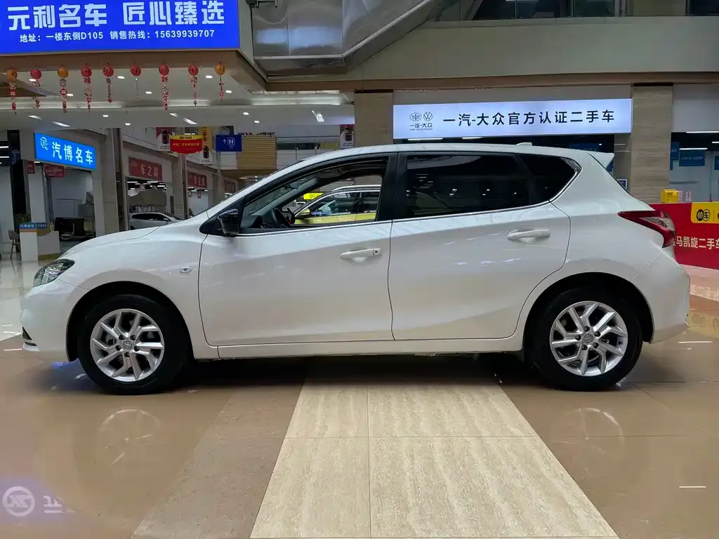 Nissan Tiida — фото 3