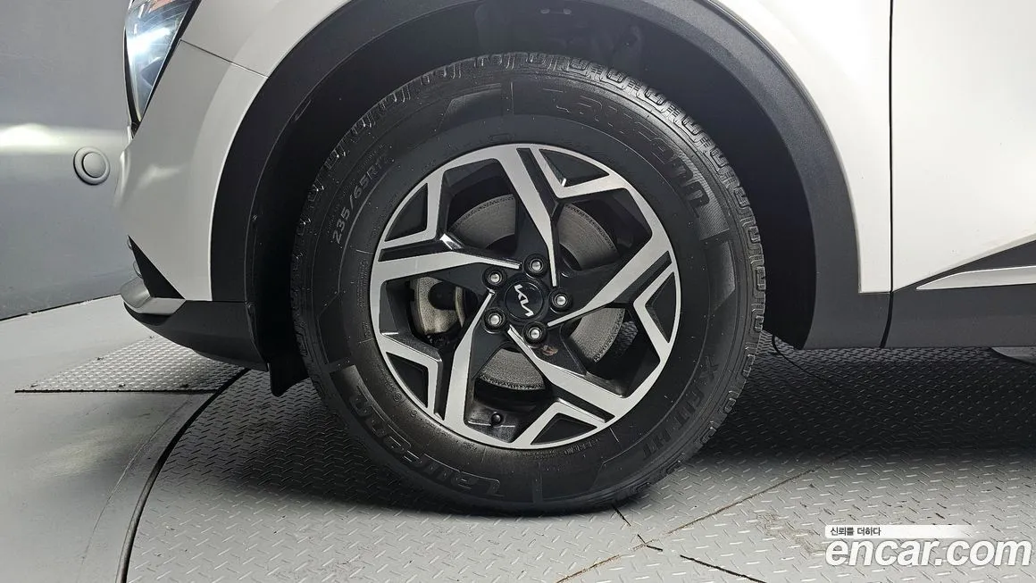 Kia Sportage — фото 10