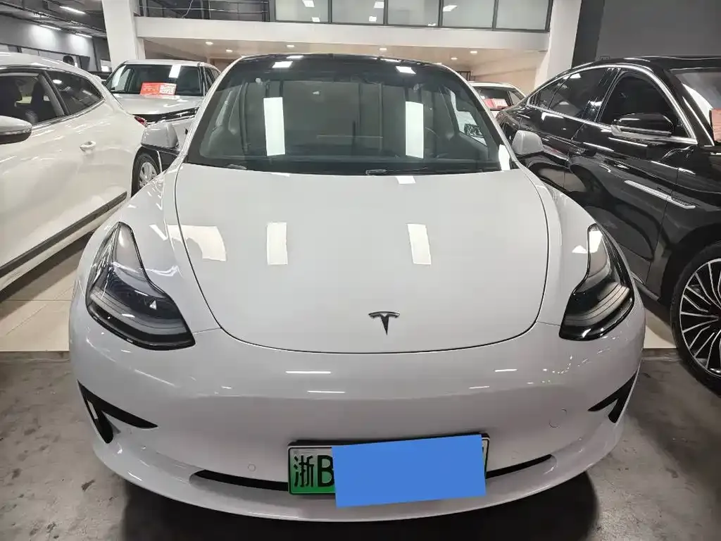 Tesla Model 3 — фото 6