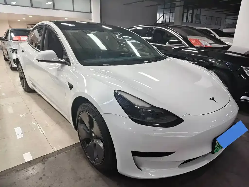 Tesla Model 3 — фото 5