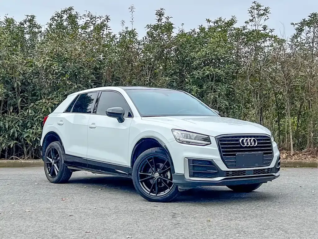 Audi Q2L — фото 10