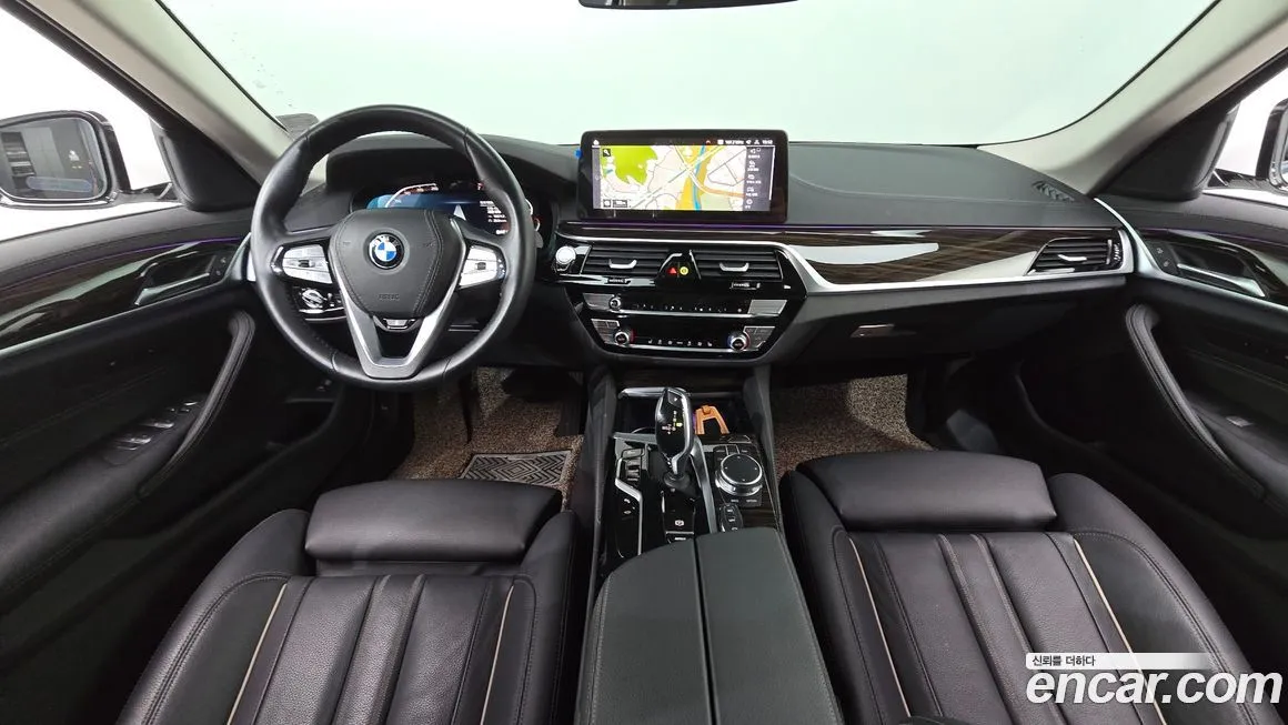 BMW 5-Series — фото 10