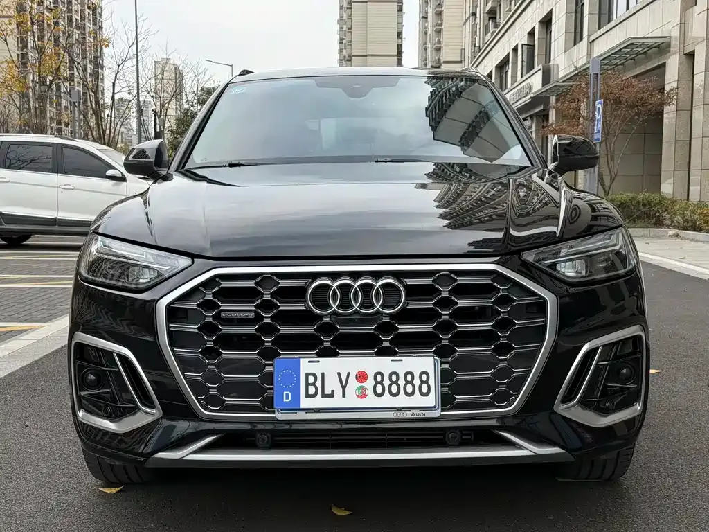 Audi Q5L — фото 5
