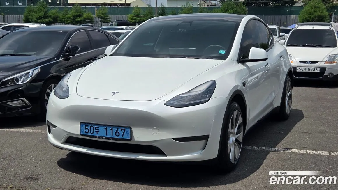 Tesla Model Y — фото 6