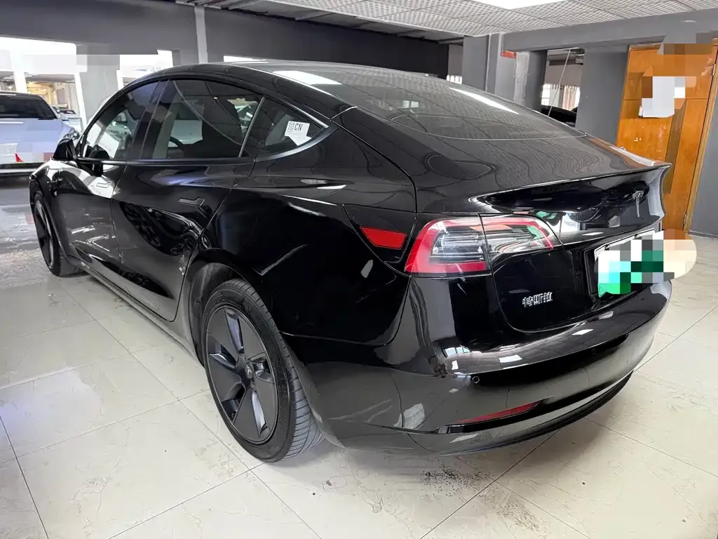 Tesla Model 3 — фото 10