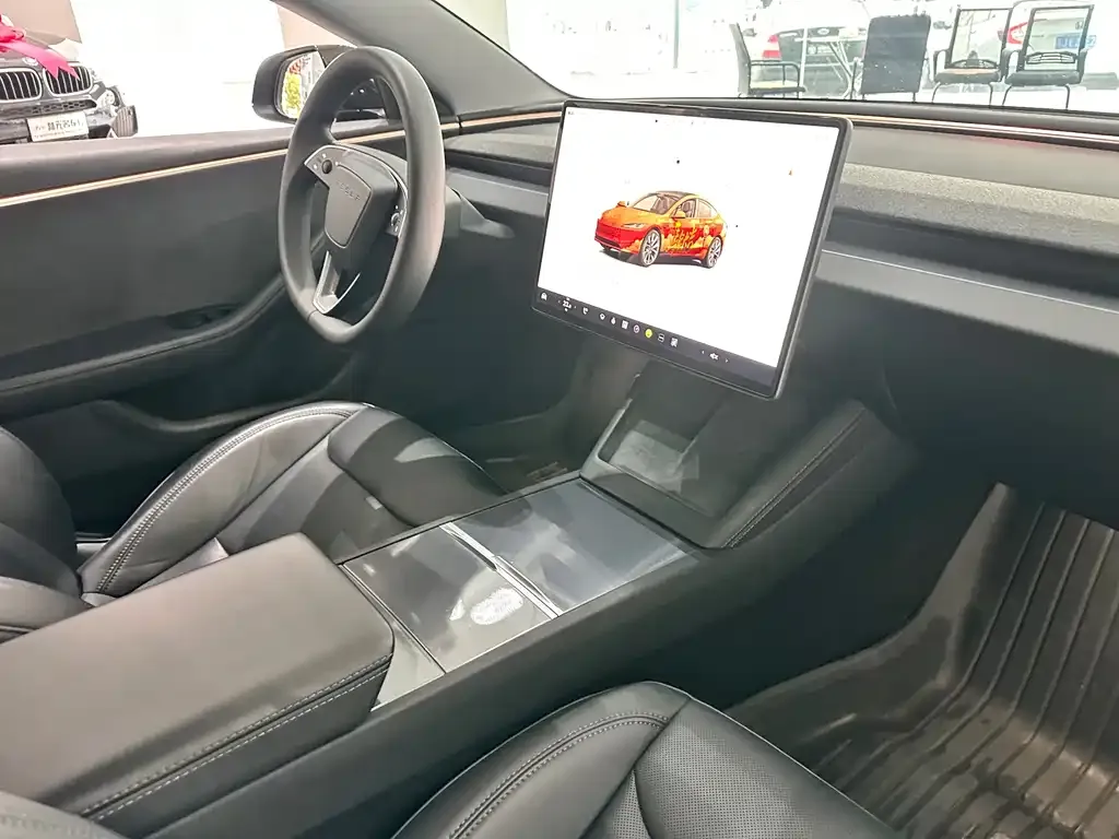 Tesla Model 3 — фото 9